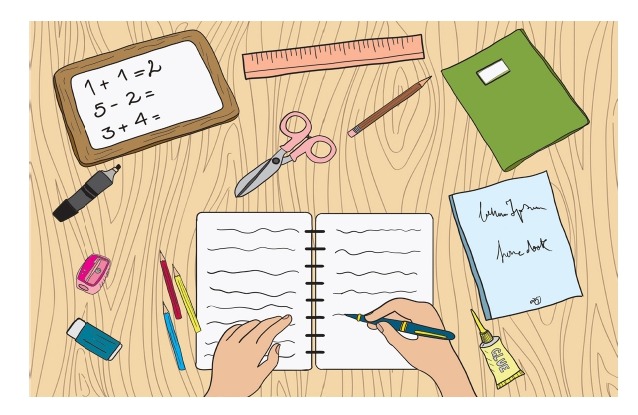 Un bureau vu de dessus avec une ardoise, une règle, des ciseaux, un crayon, un cahier, une gomme, de la colle et un stylo